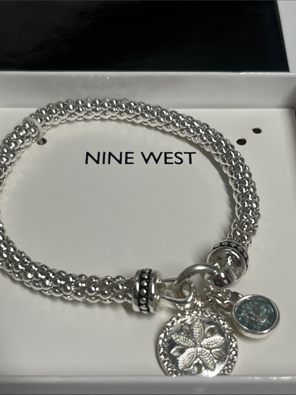 Nine West Silver Braided Charm Bracelet with Aqua Crystal Accent